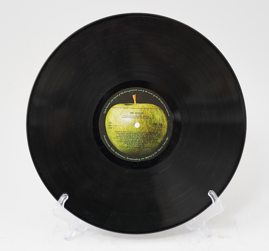 The Beatles; The Beatles (The White Album) double LP record album, No.0026851, on Apple PMC 7067, XEX 709-1, top loading cover with black inner sleeves. Condition - fair, some wear to sleeves and visible scratches to the